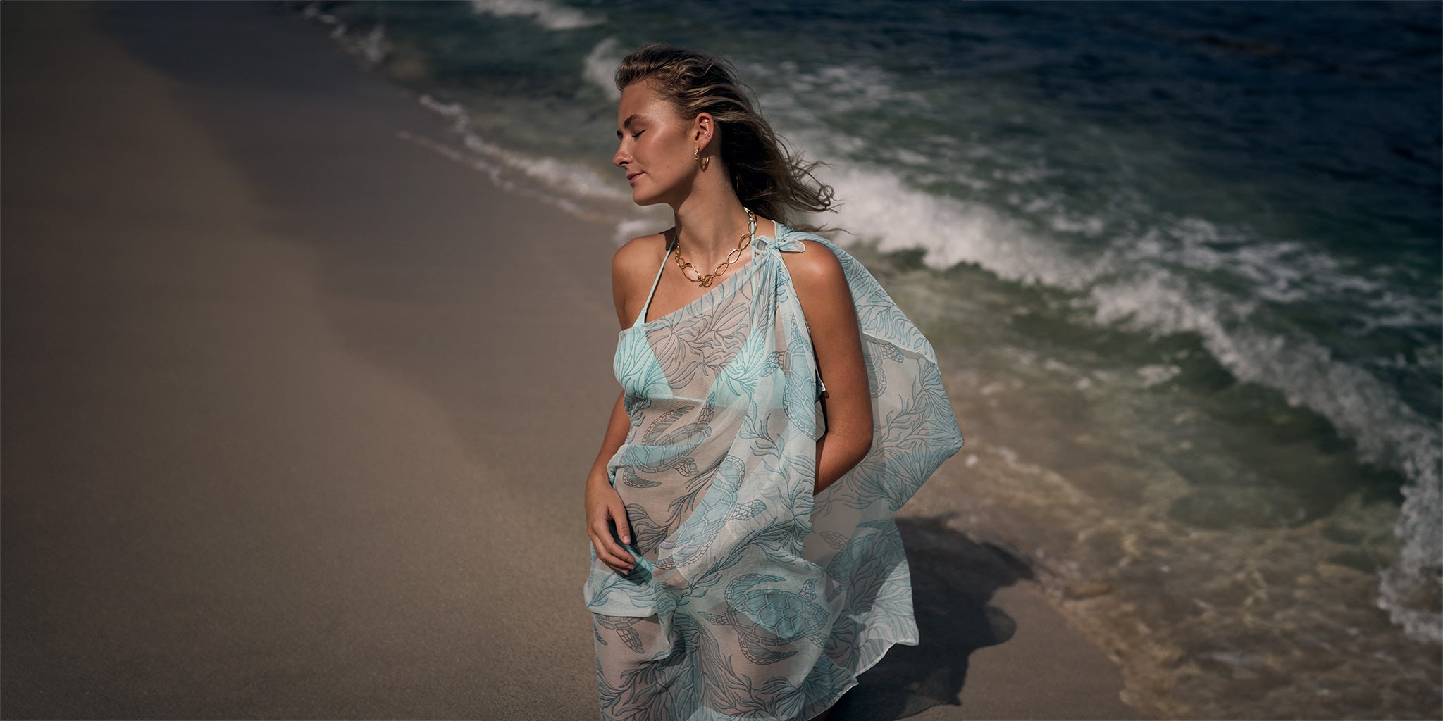 Screen-printed and finished with rolled hems sewn by hand, a feathery soft chiffon silk sarong makes a versatile addition to your holiday wardrobe or an ideal gift.