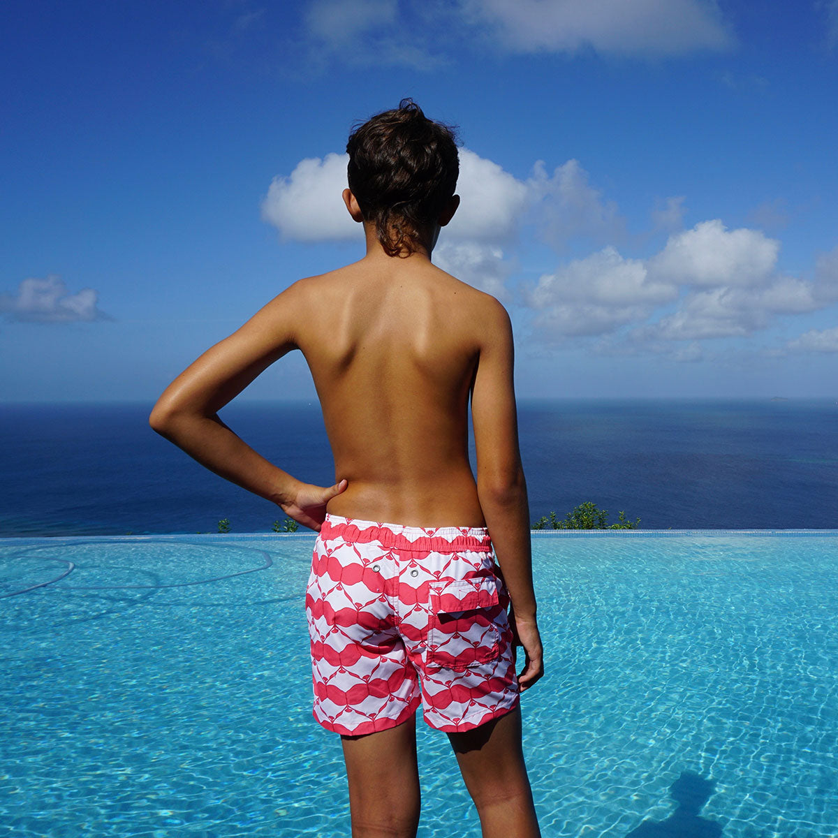 Boys swim trunks : MANTA RAY - RED infinity pool Mustique