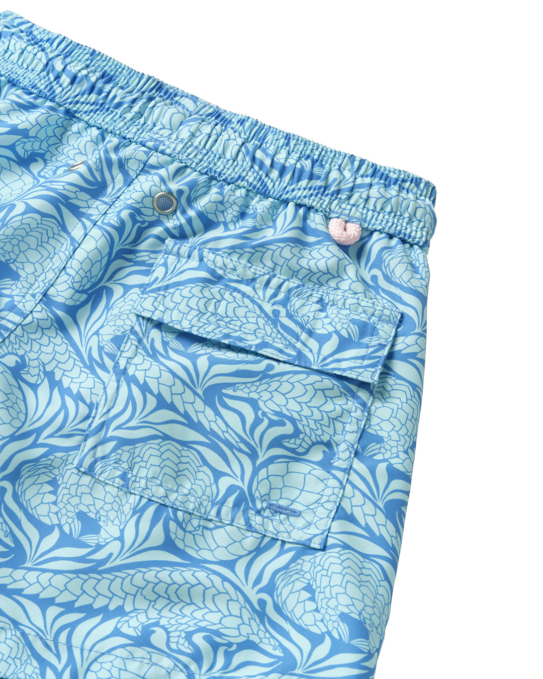 Kid's swim shorts back pocket detail in blue Pangolin print from Pink House