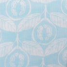 Linen fabric swatch Guava pale blue designer Lotty B Mustique