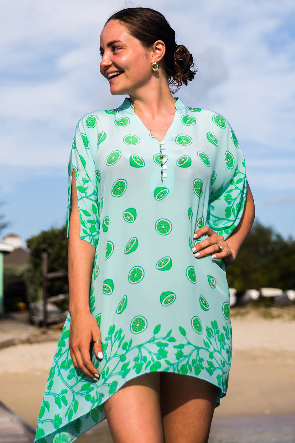 The Lotty Kaftan - Lime Tree green style: short collar, buttoned V neck, split sleeve, square hand rolled handkerchief hem