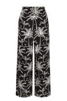 Silk cdc Gabija palazzo pants black and white plantation palm print by Lotty B Mustique