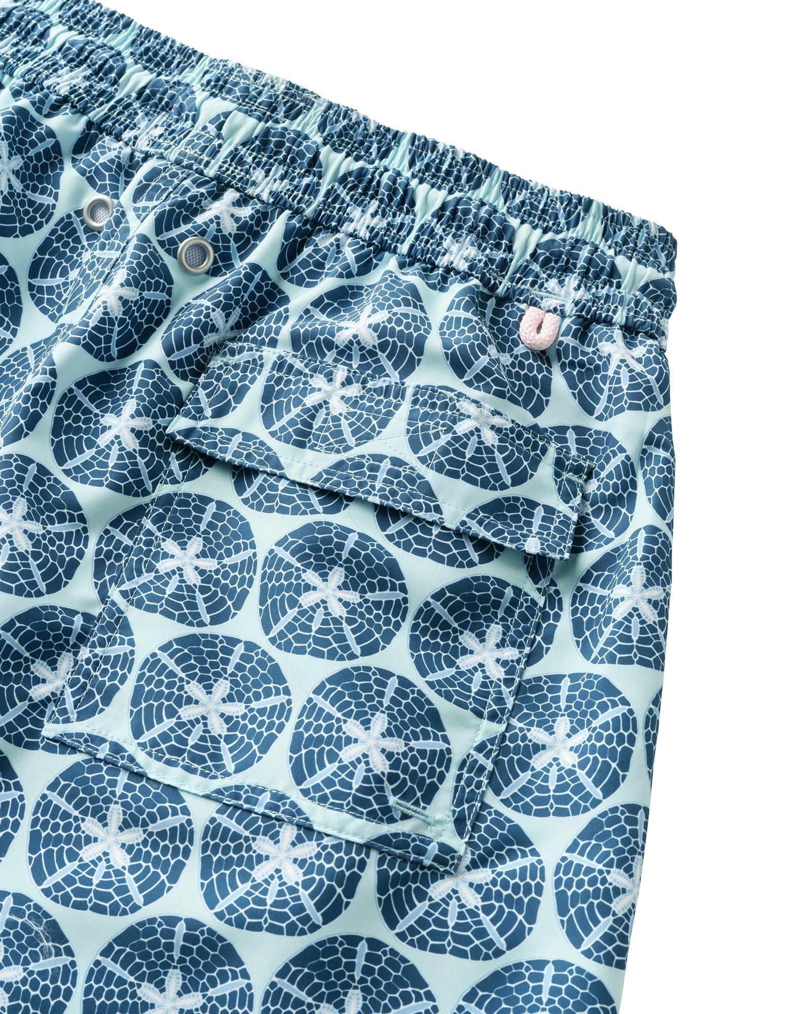 Back pocket detail of mens recycled swim shorts in blue Sand Dollar print by Pink House Mustique