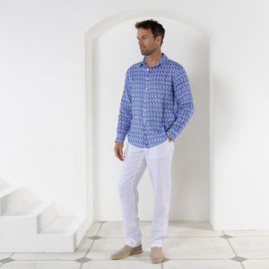 Casual white pure linen beach pants worn with striped shell blue print shirt by Pink House resortwear