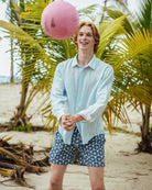 Tropical beach island holiday essentials for men, recycled swim shorts in Sand Dollar blue by Pink House Mustique