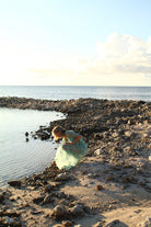 Designer resortwear caftan in sage green and white Protea print by Lotty B Mustique