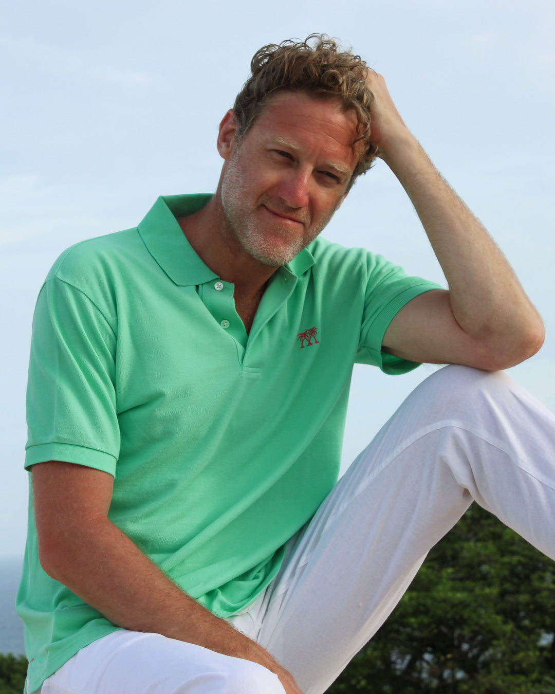 Mens pure cotton green polo shirt Mustique villa life