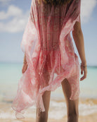 Island vacation style, silk chiffon Cosima kaftan in coral pink Sand Dollar print by designer Lotty B , Britannia Bay Mustique