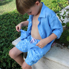 Kid's French blue linen shirt & swim shorts in blue Striped Shell print by designer Lotty B