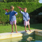 Childrens pure linen navy blue shirt & red blue guava print swim shorts  by Pink House Mustique, holiday villa lifestyle