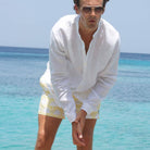 Mens premium quick-dry swim shorts in yellow FAN PALM print by Lotty B Mustique holiday clothing