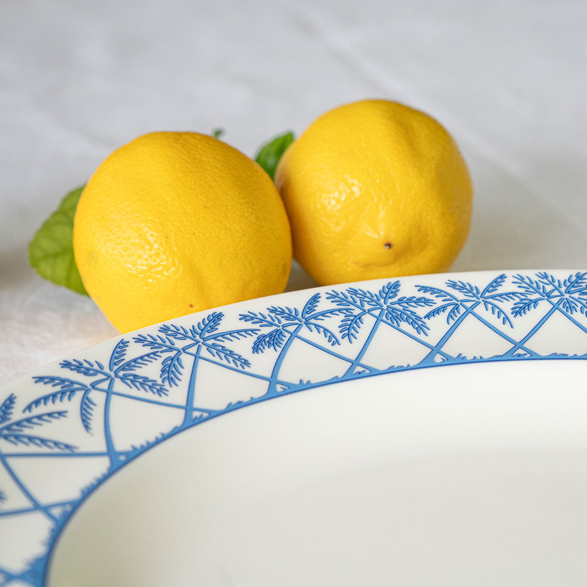 Fine bone china platter rim detail in Palms blue design