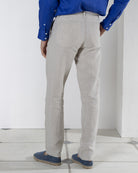 Stylish linen pants worn with dazzling blue collarless linen shirt by Pink House resortwear