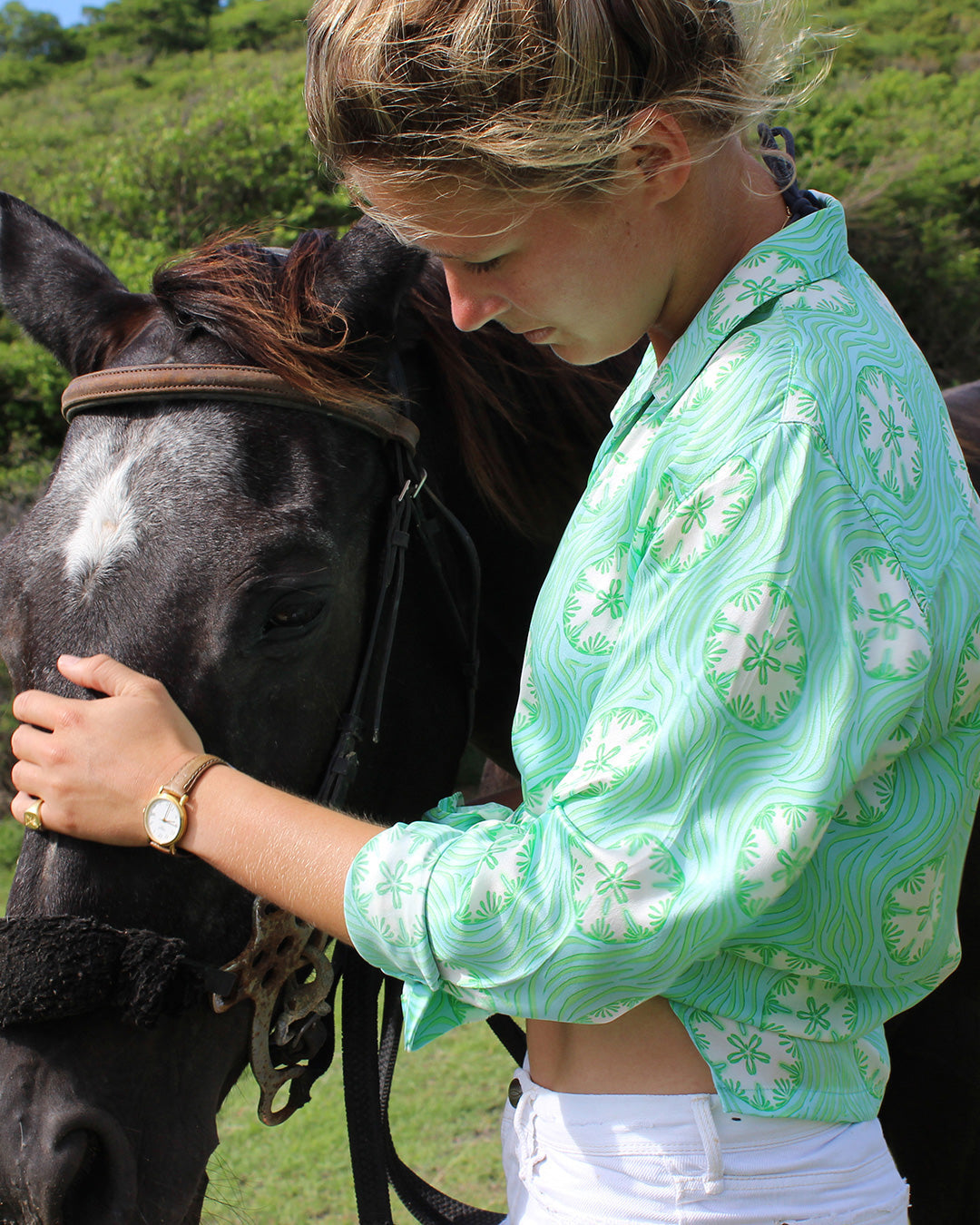 Vacation style women's silk shirt in green sand dollar print by designer Lotty B Mustique