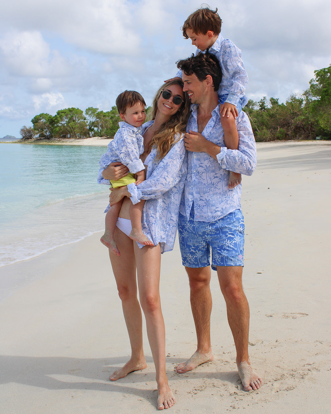 Tropical beach vacation style for all the family in signature blue Pink House Toile de Jouy print by designer Lotty B