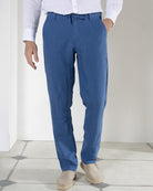 Men's casual blue pure linen pants worn with collarless white shirt by Pink House resortwear