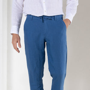 Men's casual blue pure linen pants worn with collarless white shirt by Pink House resortwear