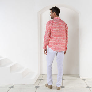 Drawstring white linen pants worn with striped shell pink print shirt by Pink House resortwear