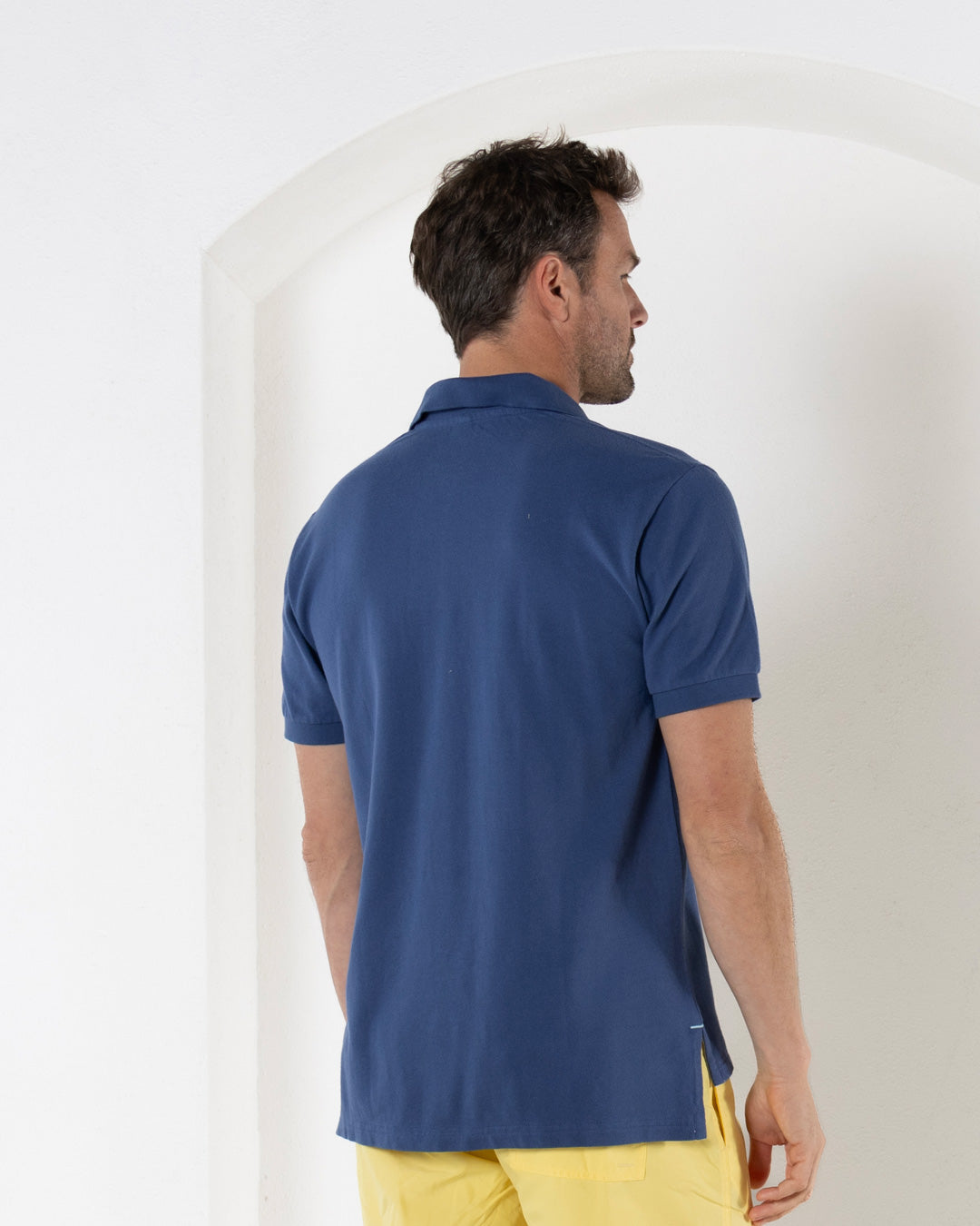 Back view of mens premium resortwear pure cotton navy blue polo shirt by Pink House