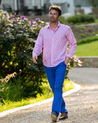 Island style linen pants in dazzling blue worn with pink linen shirt by Pink House 