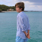 Kids linen holiday shirt in Azul blue, cotton House Pier. Mustique Island