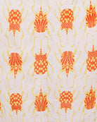 Beetle print in orange and yellow linen swatch