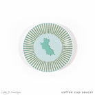 Fine bone china coffee cup saucer in Mustique Island green design by Lotty B