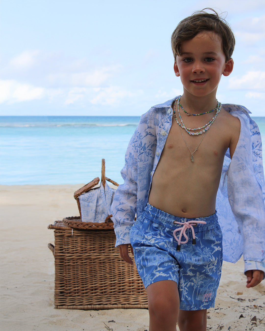 Quality kid's vacation clothes pure linen shirt and recycled swim shorts in signature blue Pink House Toile de Jouy print