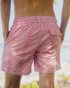 Best quick dry sustainable swim shorts in coral pink and blue Sealeaf pattern from Pink House