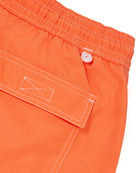 Mens quick dry orange swim shorts back pocket detail by designer Lotty B Mustique for Pink House vacation essentials