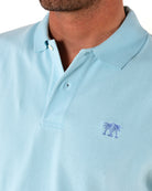 Premium quality bright blue Pink House logo embroidery detail on Mens pure cotton pale blue polo shirt