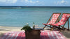 A postcard from Pink house. Wish you were here. Lagoon beach, Mustique Island. St Vincent & Grenadines.