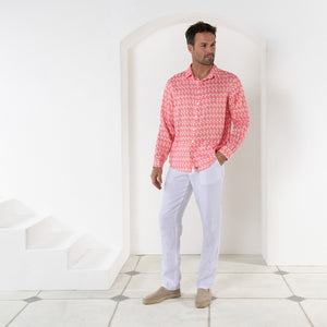 Men's vacation style white linen pants worn with striped shell pink print shirt by Pink House resortwear