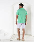 Mens pure cotton green polo shirt Mustique villa life