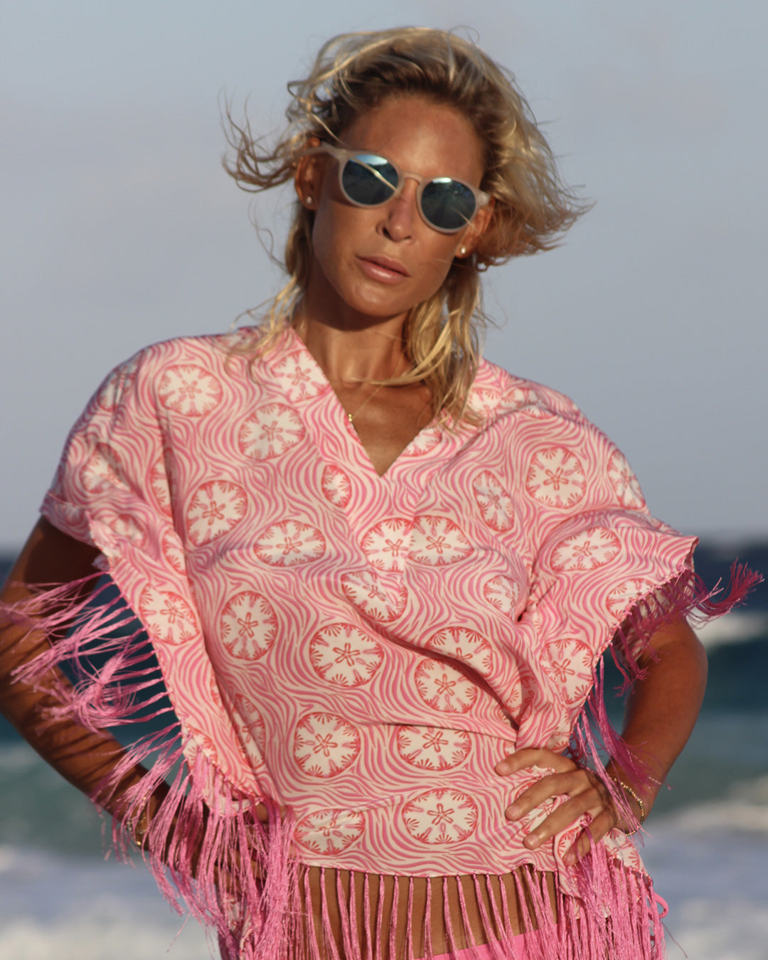 Chic Caribbean vacation style silk beach poncho cover-up in coral pink Sand Dollar Crepe-de-Chine by designer Lotty B