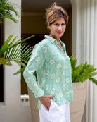 Elegant villa vacation style silk shirt in green sand dollar print by resortwear designer Lotty B Mustique