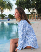 Tropical vacation women's linen shirt cover up in blue Parrot print by designer Lotty B