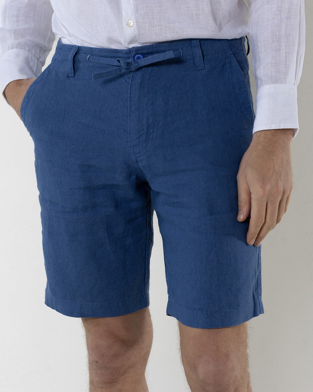 Vacation classic linens for men casual shorts in mid blue with collarless white shirt by Pink House