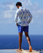 Mens linen festival shirt tropical palm print in white and blue by Lotty B Mustique